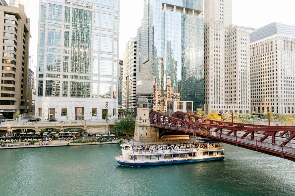 Chicago riverboat going under a bridge